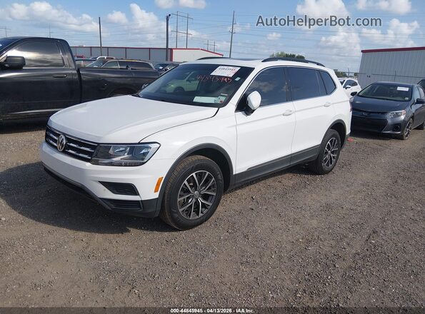 3VV3B7AX7LM019899 2020 VOLKSWAGEN TIGUAN White Առջևի ձախ երեք քառորդ տեսարան