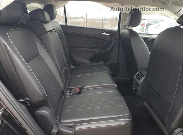 3VV3B7AX8RM127912 2024 VOLKSWAGEN TIGUAN Черный Вид задней части салона