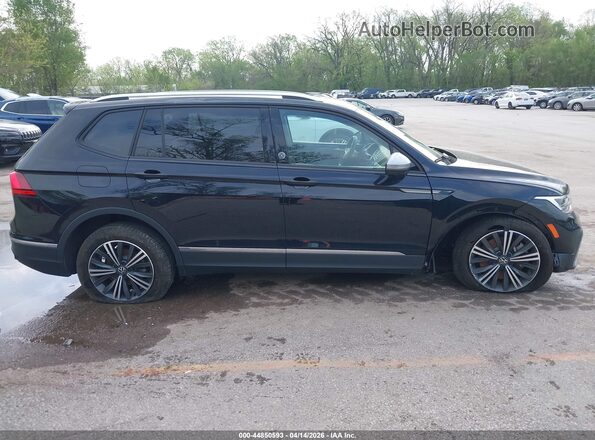 3VVAB7AX6RM230589 2024 VOLKSWAGEN TIGUAN Черный Вид задней части салона