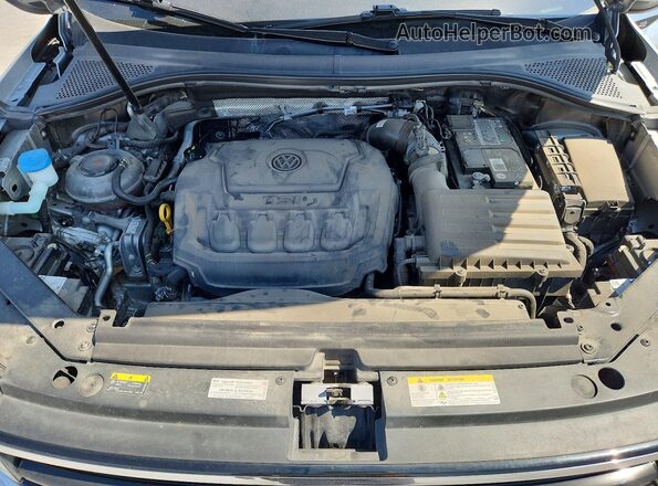 3VVCB7AX8PM124070 2023 VOLKSWAGEN TIGUAN Silver Rear interior view