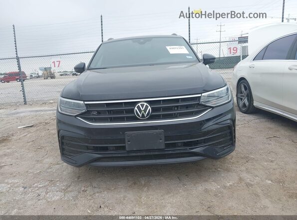 3VVCB7AX9RM100086 2024 VOLKSWAGEN TIGUAN Black Vista interior trasera