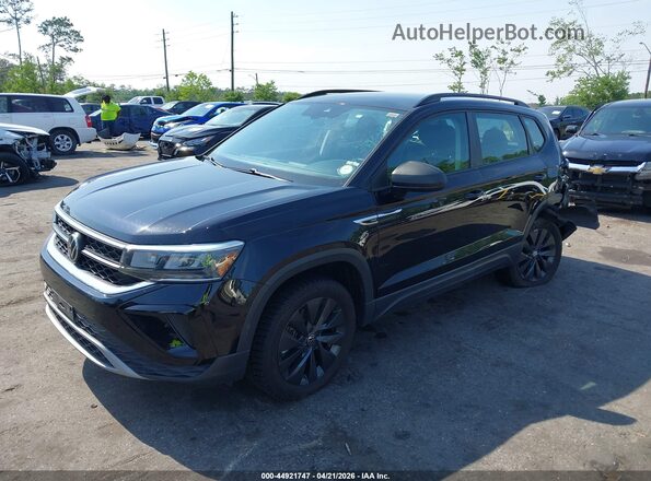 3VVDX7B2XNM005488 2022 VOLKSWAGEN TAOS Black Vista tres cuartos delantera izquierda