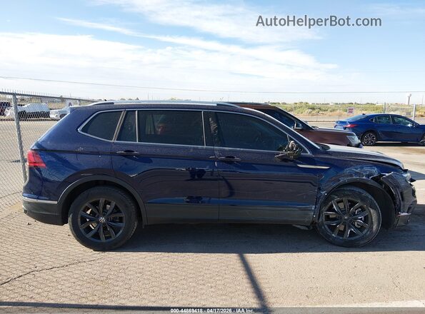 3VVMB7AX6RM038053 2024 VOLKSWAGEN TIGUAN Dark Blue Вид задней части салона
