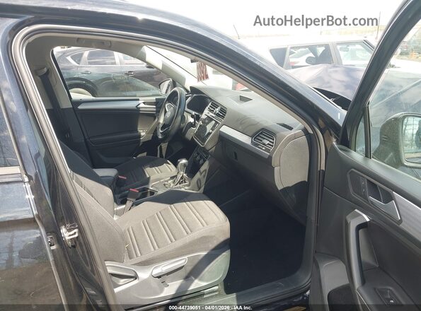 3VVRB7AX9RM212199 2024 VOLKSWAGEN TIGUAN Black Front interior view