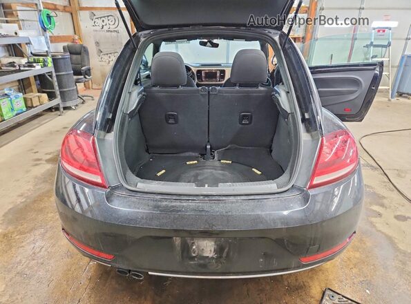3VWFD7ATXJM706002 2018 VOLKSWAGEN BEETLE Black Rear view