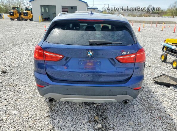 WBXHT3C36G5F63784 2016 BMW X1 Blue Вид салону спереду