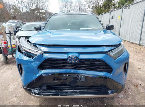4T3E6RFV7RU159358 2024 TOYOTA RAV4 HYBRID Blue Vista interior trasera