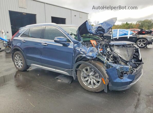 1GYFZCR43MF028086 2021 CADILLAC XT4 Blue Front view