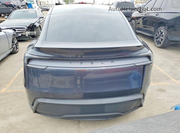 7SAYGDED1TF537387 2026 TESLA MODEL Y Gray Front interior view