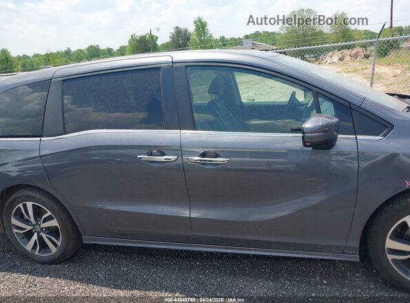 5FNRL6H81PB043544 2023 HONDA ODYSSEY Light Blue Widok wnętrza z tyłu