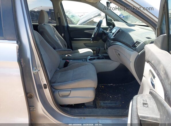 5FNYF5H17LB027472 2020 HONDA PILOT Серебряный Вид салона спереди