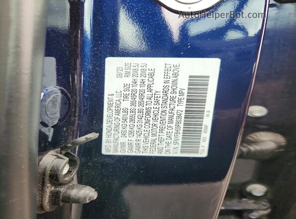 5FNYF8H09PB038472 2023 HONDA PASSPORT Blue VIN sticker view