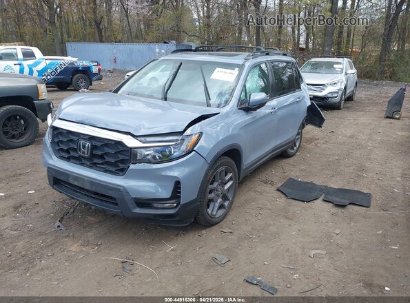 5FNYF8H57NB028144 2022 HONDA PASSPORT Blue Передня ліва чверть