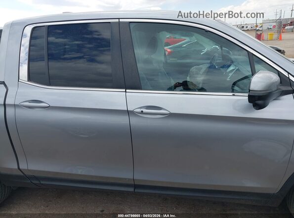 5FPYK3F6XKB033870 2019 HONDA RIDGELINE Silver Rear interior view