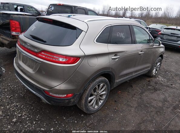 5LMCJ2C91KUL07732 2019 LINCOLN MKC Gold Tył prawy
