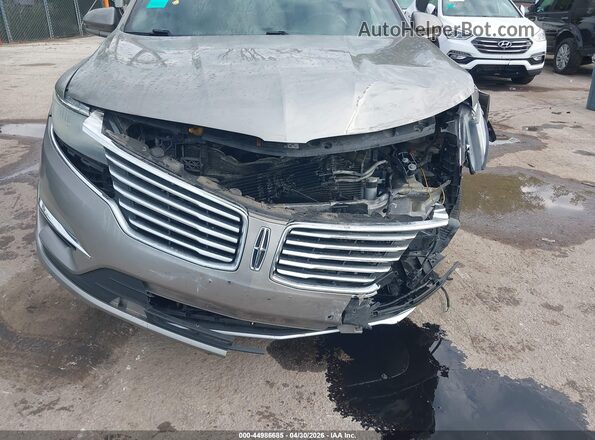 5LMCJ2C96HUL08478 2017 LINCOLN MKC Gray Սալոնի հետևի տեսք