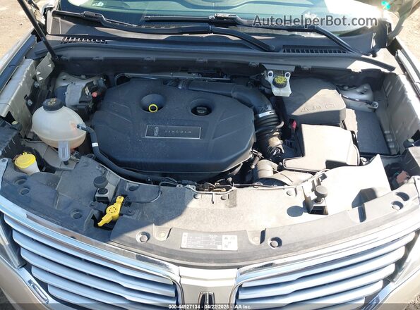 5LMCJ3D95HUL61063 2017 LINCOLN MKC Gold Rear view