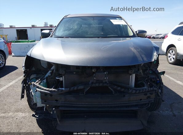 5N1AT2MT8JC769210 2018 NISSAN ROGUE Gray Vista interior trasera