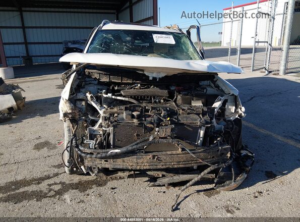 5N1AT2MVXJC722083 2018 NISSAN ROGUE Cream Widok wnętrza z tyłu
