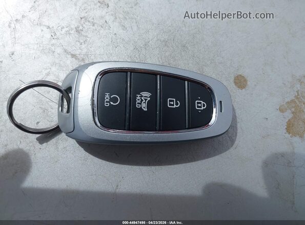 5NMJB3AEXNH006048 2022 HYUNDAI TUCSON White Vista del salpicadero
