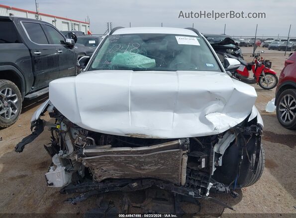 5NMJB3AEXNH006048 2022 HYUNDAI TUCSON White Vista interior trasera