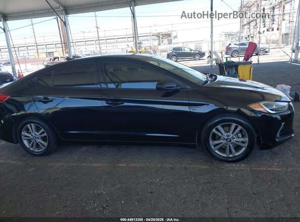 5NPD84LF9JH374287 2018 HYUNDAI ELANTRA Black Widok wnętrza z tyłu