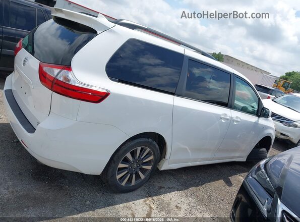 5TDJZ3DC8JS194274 2018 TOYOTA LE White Rear interior view