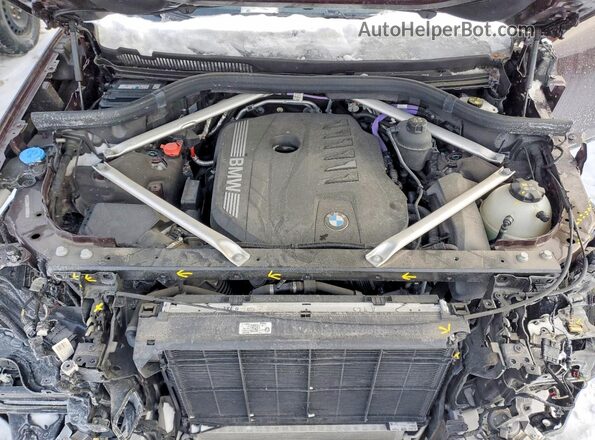 5UX23EM06P9R80586 2023 BMW X7 Maroon ძრავის განყოფილების ხედი