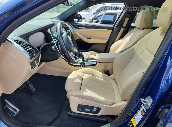 5UX2V5C00M9D85386 2021 BMW X4 Blue Widok wnętrza z przodu