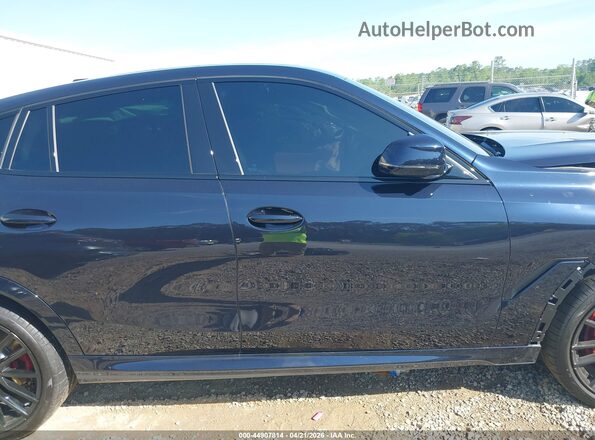 5UX33EX0XT9303101 2026 BMW X6 Black Вид задньої частини салону