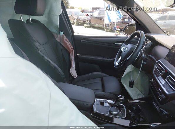5UX43DP05R9W54103 2024 BMW X3 White Widok wnętrza z przodu