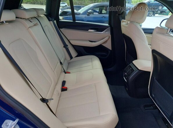 5UX43DP09R9U28811 2024 BMW X3 Blue Սալոնի հետևի տեսք
