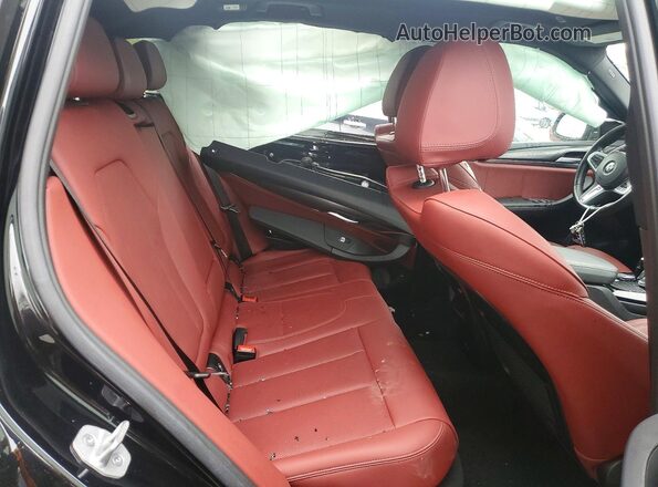 5UX53DP04R9T79375 2024 BMW X3 Black Rear interior view