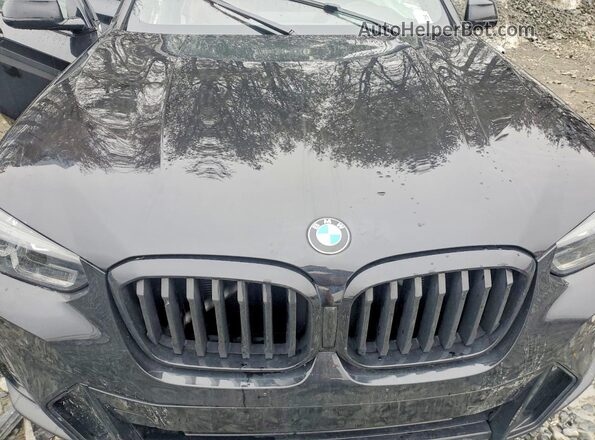 5UX53DP04R9T79375 2024 BMW X3 Black Engine compartment view