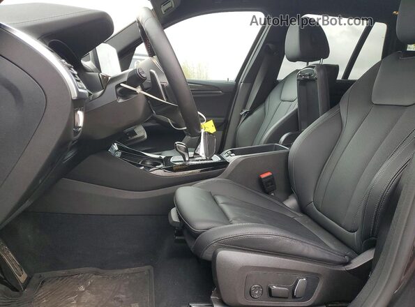 5UX83DP04R9W90415 2024 BMW X3 Charcoal Front interior view