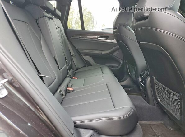 5UX83DP04R9W90415 2024 BMW X3 Charcoal Rear interior view