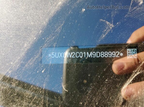 5UXCW2C01M9D88992 2021 BMW X7 Black Vista de la etiqueta del VIN
