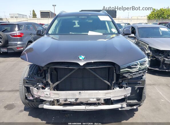 5UXCW2C03L9C02917 2020 BMW X7 Gray Սալոնի հետևի տեսք