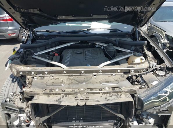 5UXCW2C03L9C02917 2020 BMW X7 Gray Հետևի տեսք