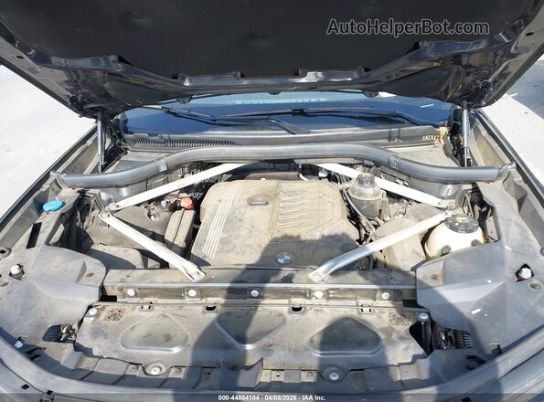 5UXCW2C08L9C17798 2020 BMW X7 Gray Rear view