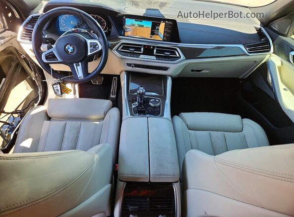 5UXCY6C06N9N43066 2022 BMW X6 Blue Вид панелі приладів