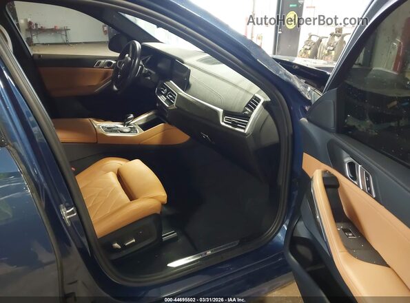 5UXCY6C07P9P29783 2023 BMW X6 Blue Front interior view