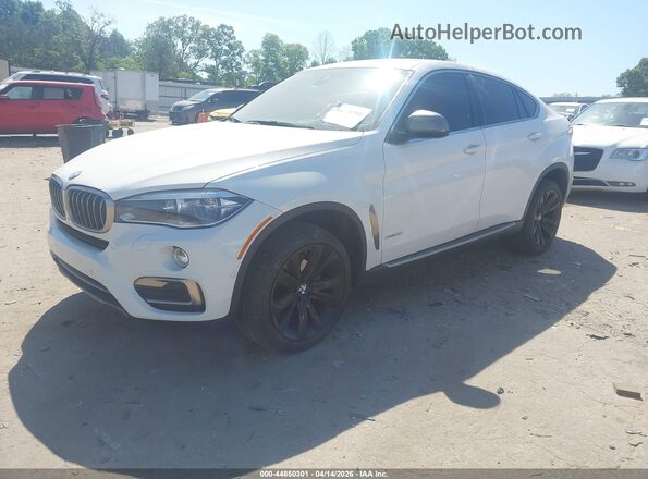 5UXKU2C50K0Z65572 2019 BMW X6 White წინა მარცხენა ხედი სამი მეოთხედიდან