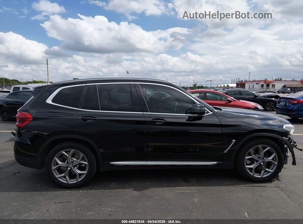 5UXTY3C03M9E54877 2021 BMW X3 Black Սալոնի հետևի տեսք