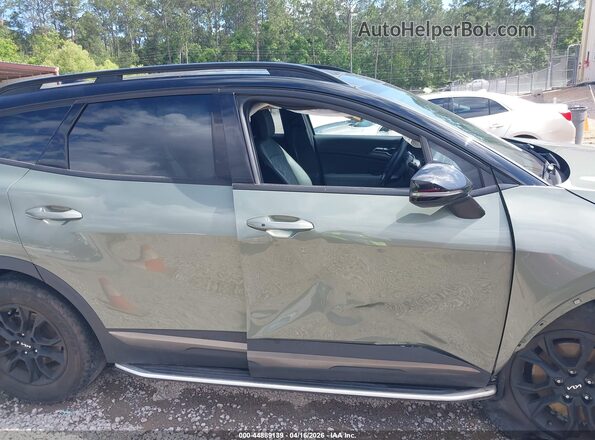 5XYK7CAF8PG081486 2023 KIA SPORTAGE Зеленый Вид задней части салона