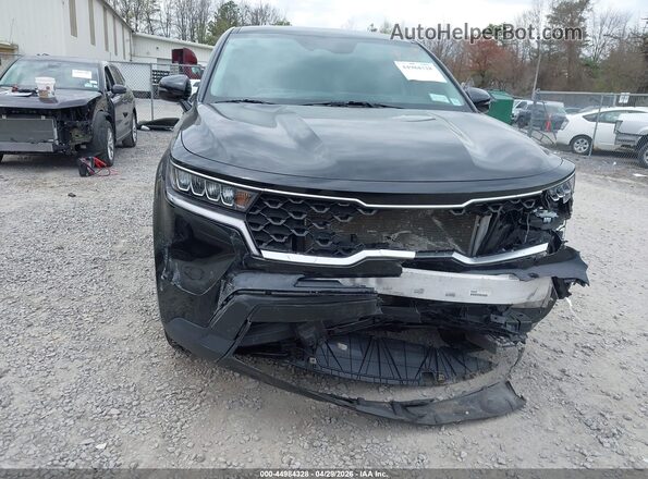 5XYRGDLC5NG097021 2022 KIA SORENTO Black Front view