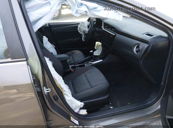 5YFBURHE4KP947889 2019 TOYOTA LL Brown Вид салону спереду