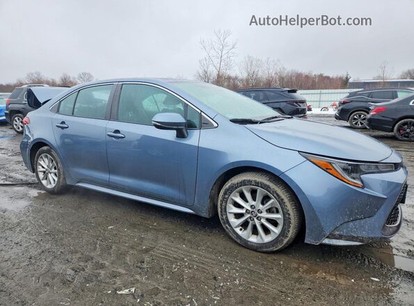 5YFFPMAE4MP162944 2021 TOYOTA LL Blue Front right