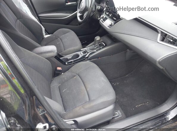 5YFS4MCE6MP083991 2021 TOYOTA LL Black Front interior view