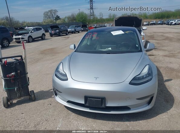 5YJ3E1EB7JF069429 2018 TESLA MODEL 3 Silver ხელსაწყოთა პანელის ხედი